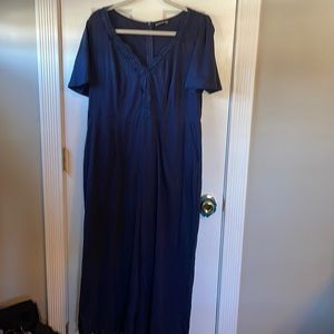 Bloomchic navy blue romper with lace trim at bottom of pants . No tags . New